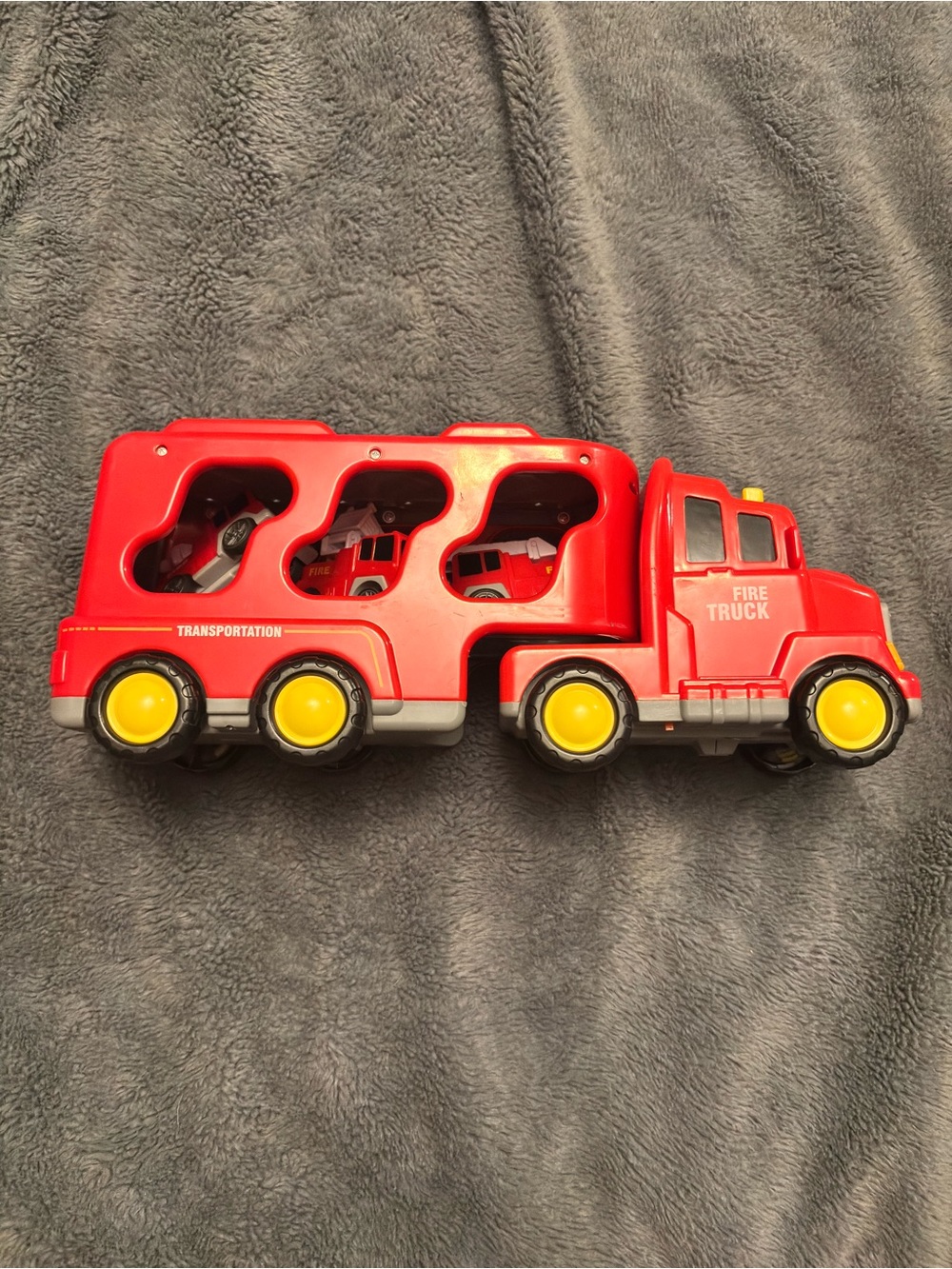Red Fire Truck Carrier Playset with Yellow Wheels